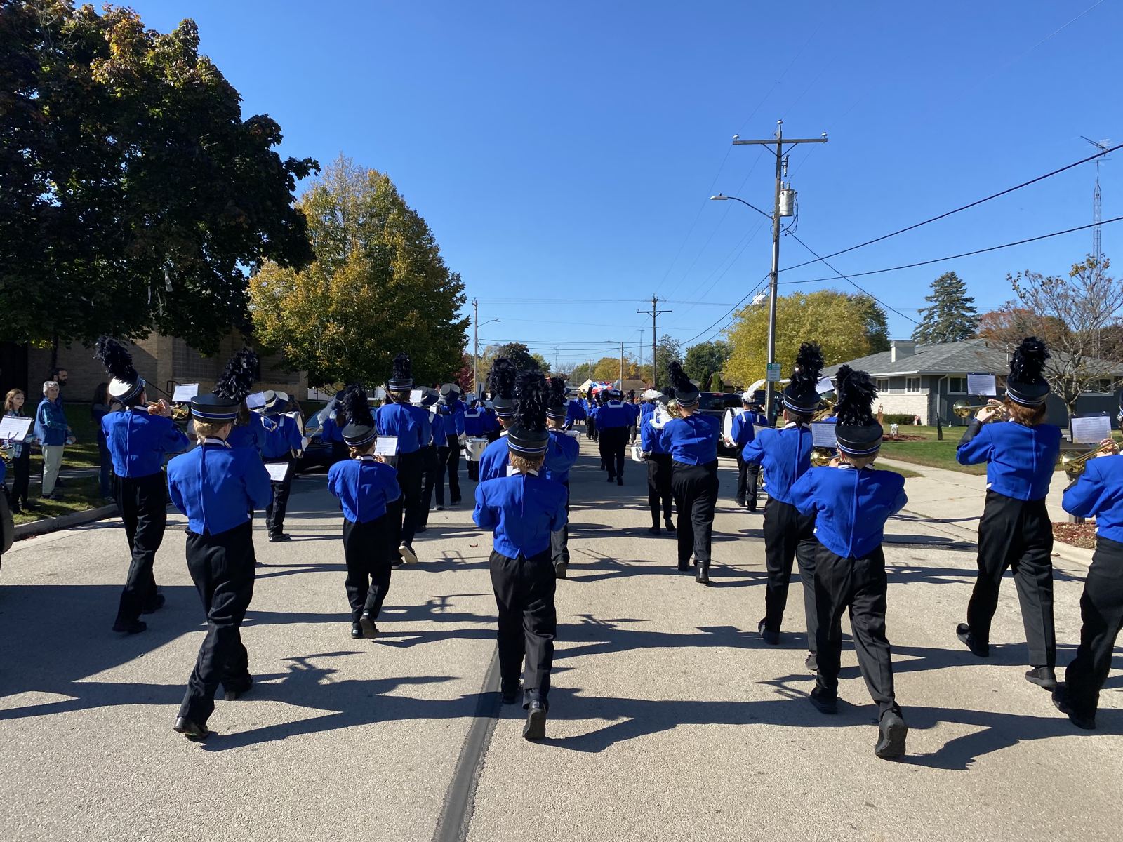 Valley Troubadours Marching Band marching down a street